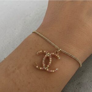 CHANEL Gold Bracelet with Pink and Rhinestone CC Charm